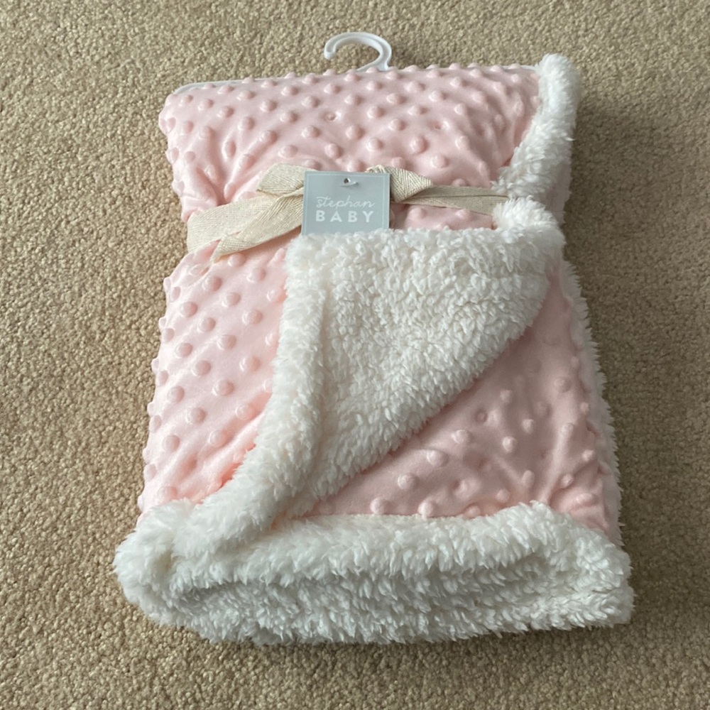 Pink polka dot fleece blanket
